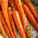 Low FODMAP Maple Dijon Carrots 7 Low FODMAP Maple Dijon Carrots, beautifully glazed and garnished with fresh thyme